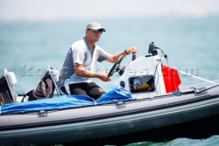 Qingdao, China, 20080810: 2008 OLYMPICS - second day of racing in the Olympic Sailing Event. Americas Cup-skipper and two-time Gold medallist at the Olympics, Jesper Bank (DEN), is the Danish 49er coach.   (no sale to Denmark)