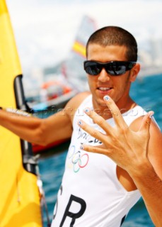 Qingdao, China, 20080811: 2008 OLYMPICS - third day of racing in the Olympic Sailing Event. Shahar Zubari (ISR) -  RS:X Class.  (no sale to Denmark)