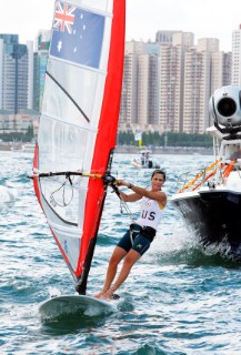 Qingdao, China, 20080811: 2008 OLYMPICS - third day of racing in the Olympic Sailing Event. Jessica Crisp (AUS) -  RS:X Class.  (no sale to Denmark)