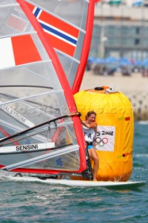 Qingdao, China, 20080811: 2008 OLYMPICS - third day of racing in the Olympic Sailing Event. Alssandra Sensini (ITA) -  RS:X Class.  (no sale to Denmark)