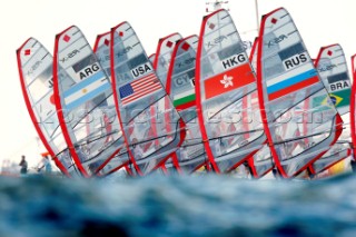 Qingdao, China, 20080811: 2008 OLYMPICS - third day of racing in the Olympic Sailing Event. Start of the second race for the women -  RS:X Class. (no sale to Denmark)