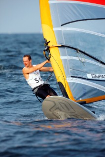 Qingdao, China, 20080815: 2008 OLYMPICS day 7 at the Olympic Sailing Regatta in Qingdao. RS:X ClassRichard Stauffacher (SUI) (no sale to Denmark)