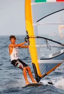 Qingdao, China, 20080815: 2008 OLYMPICS day 7 at the Olympic Sailing Regatta in Qingdao. Fabian Heidegger (ITA) - RS:X Class (no sale to Denmark)