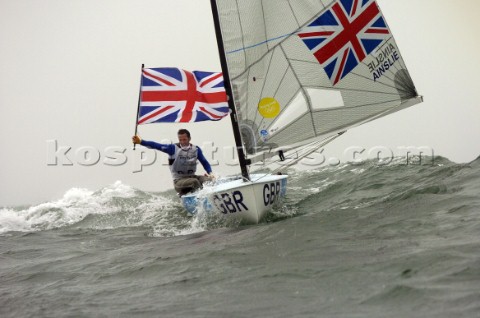 Paul Goodison wins Gold in Laser Class held aloft by team mates including Stephen Park team Manager 