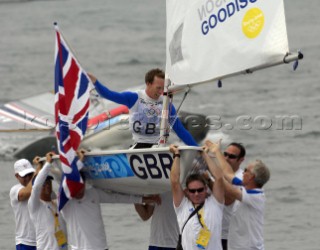 Paul Goodison wins Gold in Laser Class held aloft by team mates including Stephen Park team Manager and Ben Ainslie triple Gold winner (left) Olympics 2008 Qingdao