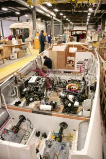 Workmen and boat builders at the Hinkley Shipyard and boat building facility