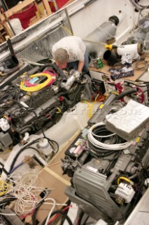 Workmen and boat builders at the Hinkley Shipyard and boat building facility