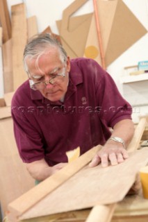 Workmen and boat builders at the Hinkley Shipyard and boat building facility