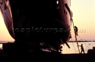 Lanscape of the build and launch party ceremony from a slipway of the red superyacht Elix