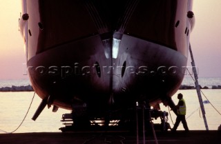 Lanscape of the build and launch party ceremony from a slipway of the red superyacht Elix