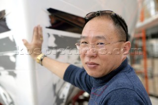 Yacht builders and skilled workers boatbuilding at the Yihong shipyard and boatbuilders in China