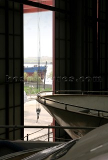 Yacht builders and skilled workers boatbuilding at the Double Happiness shipyard and boatbuilders in China