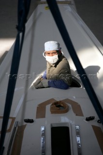 Yacht builders and skilled workers boatbuilding at the Hansheng shipyard and boatbuilders in China