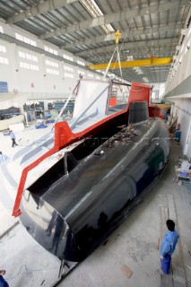 Yacht builders and skilled workers boatbuilding at the Hansheng shipyard and boatbuilders in China