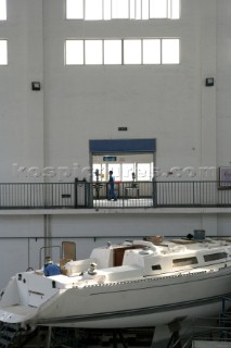 Yacht builders and skilled workers boatbuilding at the Hansheng shipyard and boatbuilders in China