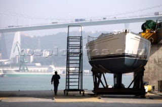 Yacht builders and skilled workers boatbuilding at the Hansheng shipyard and boatbuilders in China