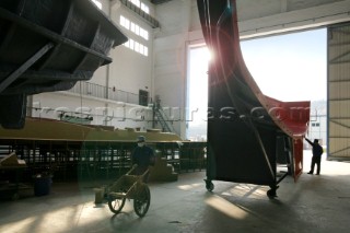 Yacht builders and skilled workers boatbuilding at the Hansheng shipyard and boatbuilders in China