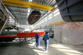 Yacht builders and skilled workers boatbuilding at the Hansheng shipyard and boatbuilders in China