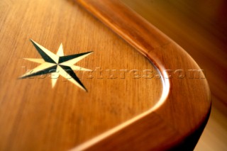 Wooden inlaid table detail on superyacht during boatbuilding at the Jet tern shipyard and boatbuilders in China