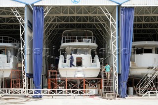 Yacht builders and skilled workers boatbuilding at the Jet tern shipyard and boatbuilders in China