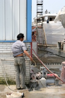 Yacht builders and skilled workers boatbuilding at the Jet tern shipyard and boatbuilders in China