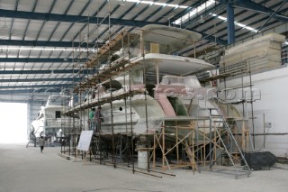 Yacht builders and skilled workers boatbuilding at the Sunbird shipyard and boatbuilders in China