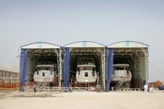 Yacht builders and skilled workers boatbuilding at the Jet tern shipyard and boatbuilders in China