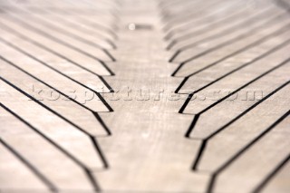 Graphic teak deck detail onboard the sailing superyacht YII Y2 near San Remo