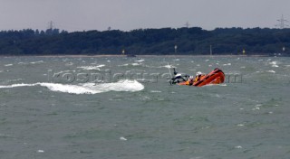 Skandia Cowes Week 2008 - RNLI Inshore Lifeboat coming to the rescue of the Extreme 40 BMW Oracle Racing