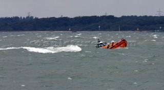 Skandia Cowes Week 2008 - RNLI Inshore Lifeboat coming to the rescue of the Extreme 40 BMW Oracle Racing