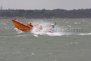 Skandia Cowes Week 2008 - RNLI Inshore Lifeboat coming to the rescue of the Extreme 40 BMW Oracle Racing