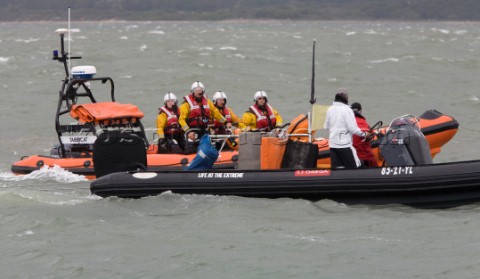 Skandia Cowes Week 2008  RNLI Inshore Lifeboat coming to the rescue of the Extreme 40 BMW Oracle Rac