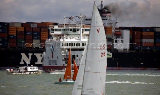 Skandia Cowes Week 2008 - Commercial container ship moves through traffic and navigation congestion in confined waters of the Solent. Potential collisions are common.