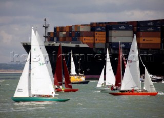 Skandia Cowes Week 2008 - Commercial container ship moves through traffic and navigation congestion in confined waters of the Solent. Potential collisions are common.