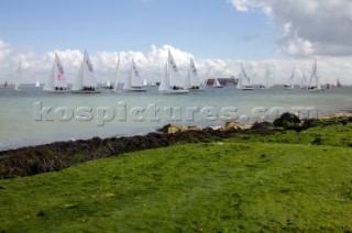 Skandia Cowes Week 2008 - Sonar fleet close to rocks on the shore