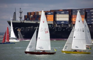 Skandia Cowes Week 2008 - Commercial container ship moves through traffic and navigation congestion in confined waters of the Solent. Potential collisions are common.