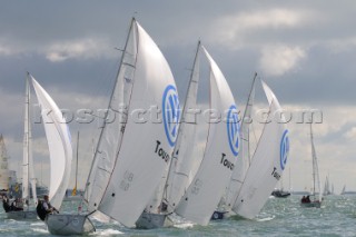 laser sb3 sailing downwide Cowes Week Isle of Wight with there asymmetric sails set