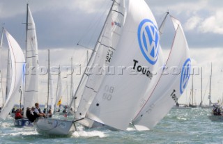 laser sb3 sailing downwide Cowes Week Isle of Wight with there asymmetric sails set