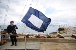 the squadron startline using cannons for starting signals sailing Cowes Week Isle of Wight