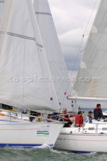 close sailing as rounding a mark of the course sailing Cowes Week Isle of Wight