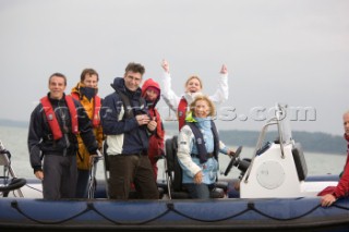 THE SOLENT, UK - August 31st: For a briefÊspellÊonce each summer on the lowest of spring tides, members of the Island Sailing Club and Royal Southern Yacht Club sail outÊto The Brambles sand bank in the middle of The Solent andÊplay cricket, before the tide rushes back in one hour later.ÊThe fixture was first started in the 1950Õs by the late Uffa Fox, a sailing companion of the Duke of Edinburgh, the Royal Southern and the Island Sailing Club compete every year. As soon as the sandbank appears the stumps are put up and the match gets under way. Many of the competitors dress all in cricket whites and ÔThe Bramble InnÕ is erected to serve drinks to spectators. The Bramble Inn is one of the most bizarre pubs in England: it is in the middle of the sea and exists only for about an hour each year.