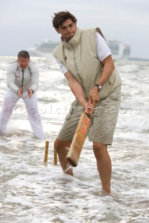 THE SOLENT, UK - August 31st: For a briefÊspellÊonce each summer on the lowest of spring tides, members of the Island Sailing Club and Royal Southern Yacht Club sail outÊto The Brambles sand bank in the middle of The Solent andÊplay cricket, before the tide rushes back in one hour later.ÊThe fixture was first started in the 1950Õs by the late Uffa Fox, a sailing companion of the Duke of Edinburgh, the Royal Southern and the Island Sailing Club compete every year. As soon as the sandbank appears the stumps are put up and the match gets under way. Many of the competitors dress all in cricket whites and ÔThe Bramble InnÕ is erected to serve drinks to spectators. The Bramble Inn is one of the most bizarre pubs in England: it is in the middle of the sea and exists only for about an hour each year.