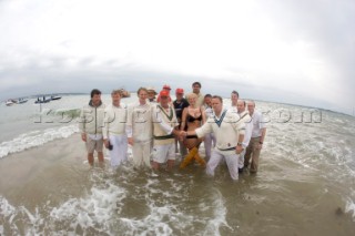 THE SOLENT, UK - August 31st: For a briefÊspellÊonce each summer on the lowest of spring tides, members of the Island Sailing Club and Royal Southern Yacht Club sail outÊto The Brambles sand bank in the middle of The Solent andÊplay cricket, before the tide rushes back in one hour later.ÊThe fixture was first started in the 1950Õs by the late Uffa Fox, a sailing companion of the Duke of Edinburgh, the Royal Southern and the Island Sailing Club compete every year. As soon as the sandbank appears the stumps are put up and the match gets under way. Many of the competitors dress all in cricket whites and ÔThe Bramble InnÕ is erected to serve drinks to spectators. The Bramble Inn is one of the most bizarre pubs in England: it is in the middle of the sea and exists only for about an hour each year.