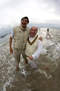 THE SOLENT, UK - August 31st: For a briefÊspellÊonce each summer on the lowest of spring tides, members of the Island Sailing Club and Royal Southern Yacht Club sail outÊto The Brambles sand bank in the middle of The Solent andÊplay cricket, before the tide rushes back in one hour later.ÊThe fixture was first started in the 1950Õs by the late Uffa Fox, a sailing companion of the Duke of Edinburgh, the Royal Southern and the Island Sailing Club compete every year. As soon as the sandbank appears the stumps are put up and the match gets under way. Many of the competitors dress all in cricket whites and ÔThe Bramble InnÕ is erected to serve drinks to spectators. The Bramble Inn is one of the most bizarre pubs in England: it is in the middle of the sea and exists only for about an hour each year.