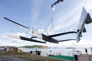 ANACORTES, USA - September 1st: The new BMW Oracle trimaran commissioned by Larry Ellyson and helmed and skippered by Russell Coutts touches the water and undergoes preliminary sailing trials following its build in total secrecy in a shipyard in Anacortes, USA. The yacht is 90ft long and 90ft wide with a mast of 158ft. It has been built to race the Swiss defender Alinghi in the 33rd Americas Cup. It is probably the fastest and most powerful multihull ever built.