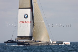 ANACORTES, USA - September 1st: The new BMW Oracle trimaran commissioned by Larry Ellyson and helmed and skippered by Russell Coutts touches the water and undergoes preliminary sailing trials following its build in total secrecy in a shipyard in Anacortes, USA. The yacht is 90ft long and 90ft wide with a mast of 158ft. It has been built to race the Swiss defender Alinghi in the 33rd Americas Cup. It is probably the fastest and most powerful multihull ever built.