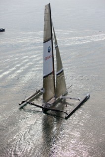 ANACORTES, WA - SEPTEMBER 2: The new BMW Oracle trimaran commissioned by Larry Ellyson and helmed and skippered by Russell Coutts touches the water and undergoes preliminary sailing trials following its build in total secrecy in a shipyard in Anacortes, USA. The yacht is 90ft long and 90ft wide with a mast of 158ft. It has been built to race the Swiss defender Alinghi in the 33rd Americas Cup. It is probably the fastest and most powerful multihull ever built.