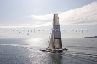 ANACORTES, WA - SEPTEMBER 2: The new BMW Oracle trimaran commissioned by Larry Ellyson and helmed and skippered by Russell Coutts touches the water and undergoes preliminary sailing trials following its build in total secrecy in a shipyard in Anacortes, USA. The yacht is 90ft long and 90ft wide with a mast of 158ft. It has been built to race the Swiss defender Alinghi in the 33rd Americas Cup. It is probably the fastest and most powerful multihull ever built.