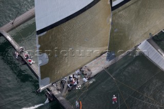 ANACORTES, WA - SEPTEMBER 2: The new BMW Oracle trimaran commissioned by Larry Ellyson and helmed and skippered by Russell Coutts touches the water and undergoes preliminary sailing trials following its build in total secrecy in a shipyard in Anacortes, USA. The yacht is 90ft long and 90ft wide with a mast of 158ft. It has been built to race the Swiss defender Alinghi in the 33rd Americas Cup. It is probably the fastest and most powerful multihull ever built.