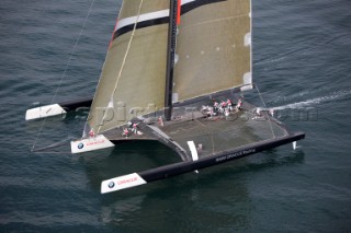 ANACORTES, WA - SEPTEMBER 2: The new BMW Oracle trimaran commissioned by Larry Ellyson and helmed and skippered by Russell Coutts touches the water and undergoes preliminary sailing trials following its build in total secrecy in a shipyard in Anacortes, USA. The yacht is 90ft long and 90ft wide with a mast of 158ft. It has been built to race the Swiss defender Alinghi in the 33rd Americas Cup. It is probably the fastest and most powerful multihull ever built.